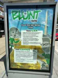 poster at the bus stop showing cannabis laws